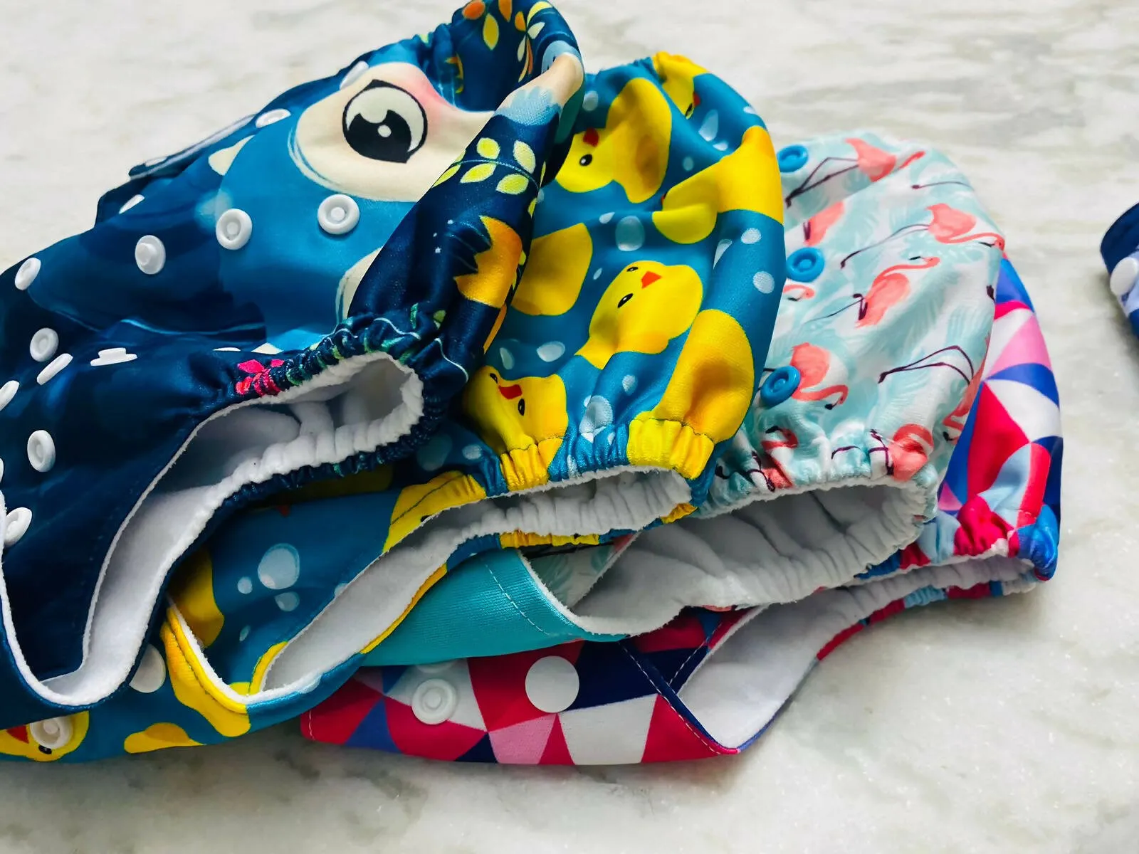 5 Cloth Diapers and 6 Pads for Baby